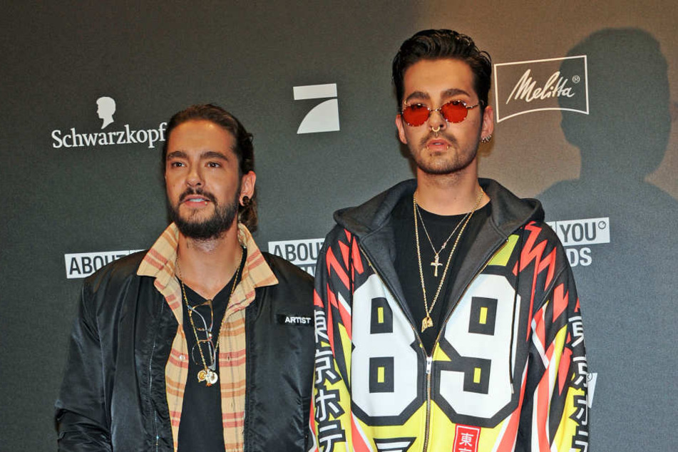 Bill Kaulitz (r.) und sein Zwillingsbruder Tom. Der kuschelt derzeit mit Heidi Klum.