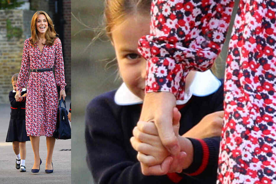 Taffes Mädchen, nur zur Einschulung dann doch ein bisschen schüchtern: Prinzessin Charlotte versucht, sich hinter ihrer Mutter, Herzogin Kate, zu verstecken.