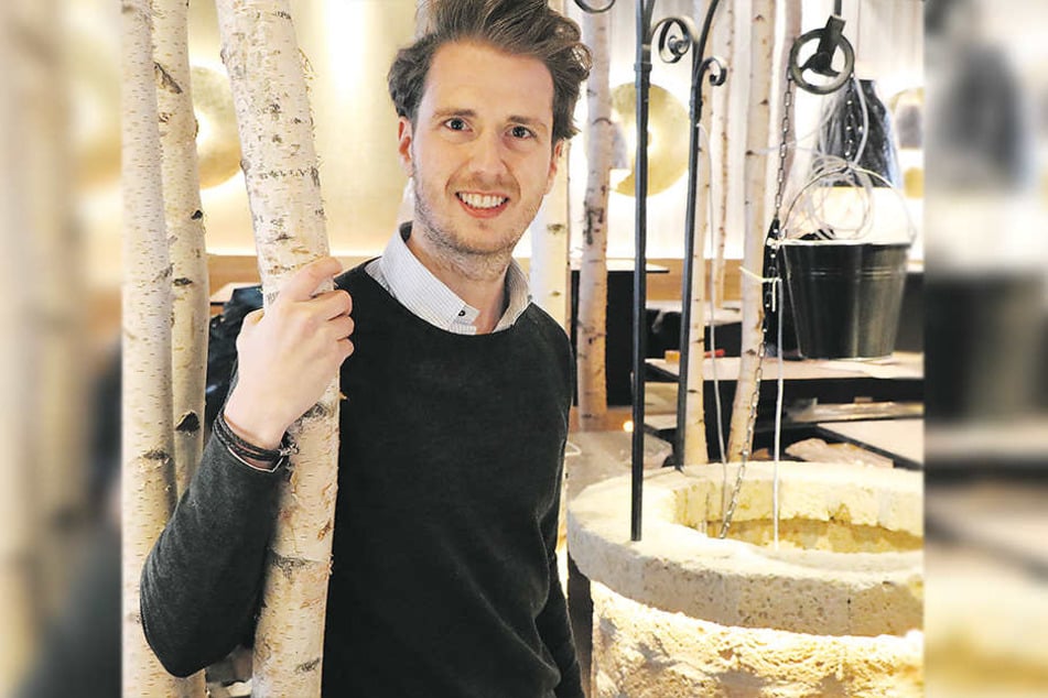Mit Birkenstämmen und Brunnen: Hans im Glück Franchisenehmer Frank Dewitz.