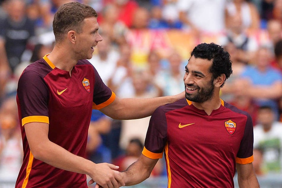 Spielten bis zum letzten Sommer zusammen und sind heute Abend Gegenspieler: Edin Dzeko (l.) und der heutige Liverpool-Spieler Mohamed Salah (r.).
