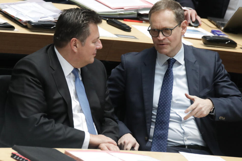 Andreas Geisel (l.) mit Berlins Bürgermeister Michael Müller (r.).