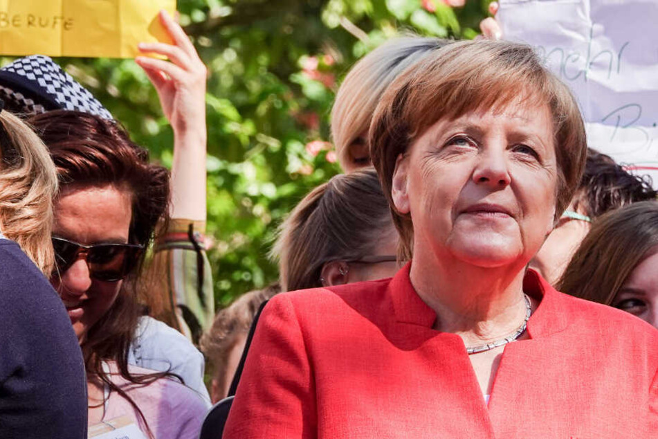 In Münster hat Kanzlerin Angela Merkel ein volles Programm.