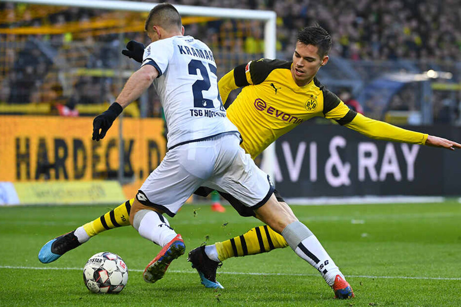 Machte lange Zeit ein überragendes Spiel: Dortmunds Julian Weigl (r.) räumte hinten viel ab. Hier stoppt er den Lauf von TSG-Stürmer Andrej Kramaric (l.).