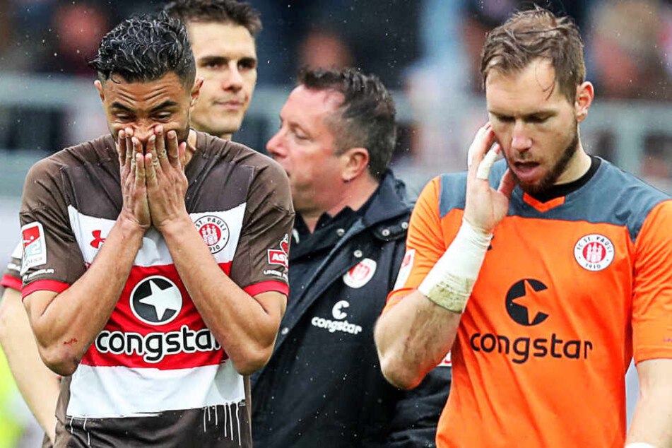 Aziz Bouhaddouz (l.) und Robin Himmelmann (r.) steht die Ratlosigkeit ins Gesicht geschrieben