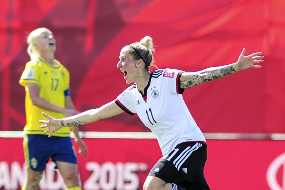 Ihr sportlicher Höhepunkt: Anja Mittag (M.) holte mit
dem deutschen Team Olympia-Gold.