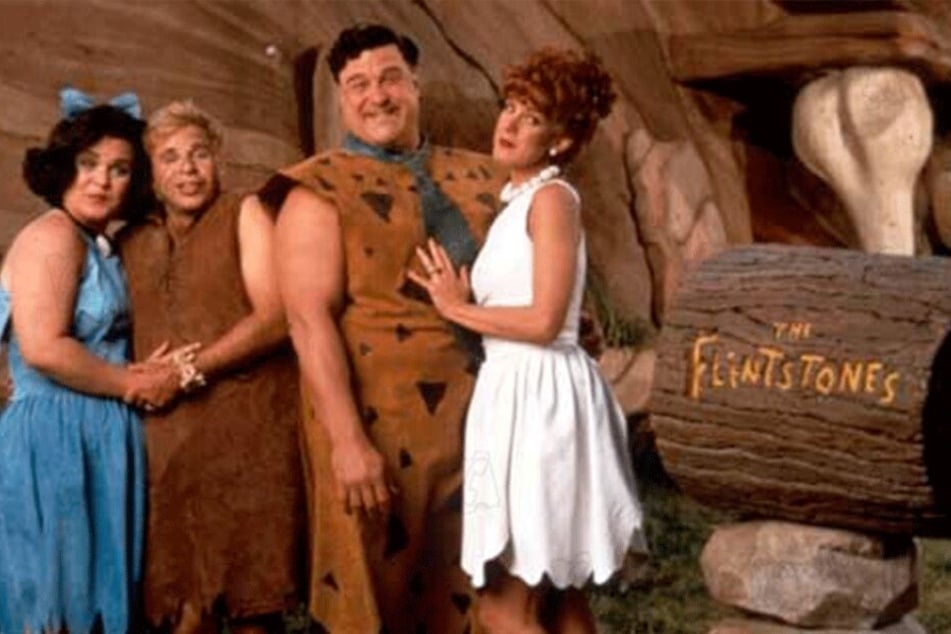John Goodman, Elizabeth Perkins, Rick Moranis und Rosie O’Donnell im Realfilm von 1994.