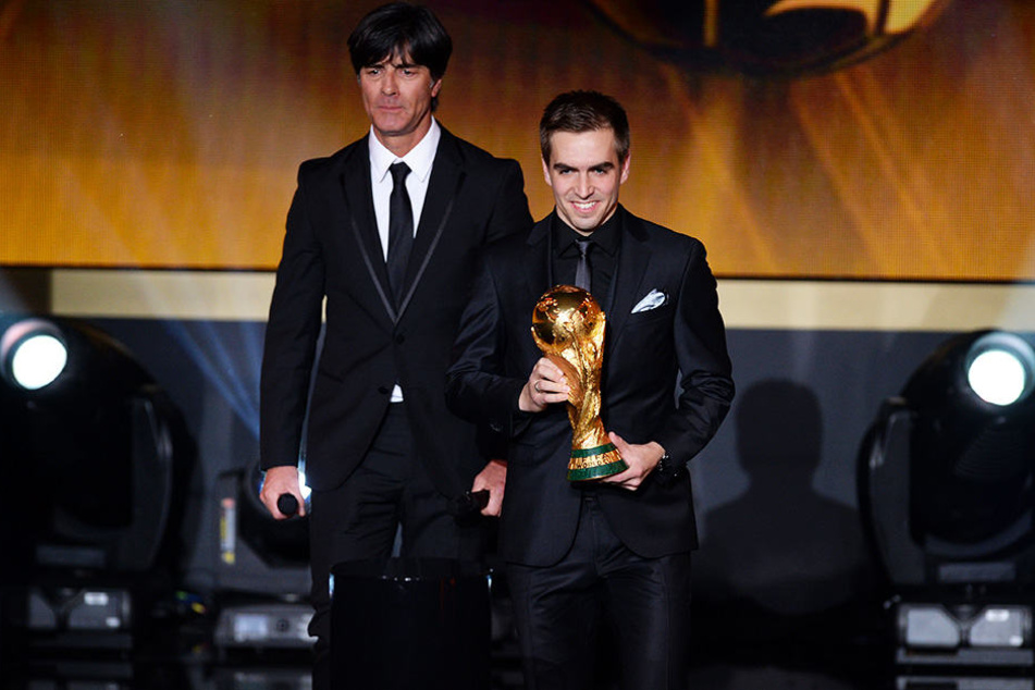 Haben unterschiedliche Ansichten: DFB-Bundestrainer Joachim Löw (l.) und Weltmeister-Kapitän Philipp Lahm (r.).