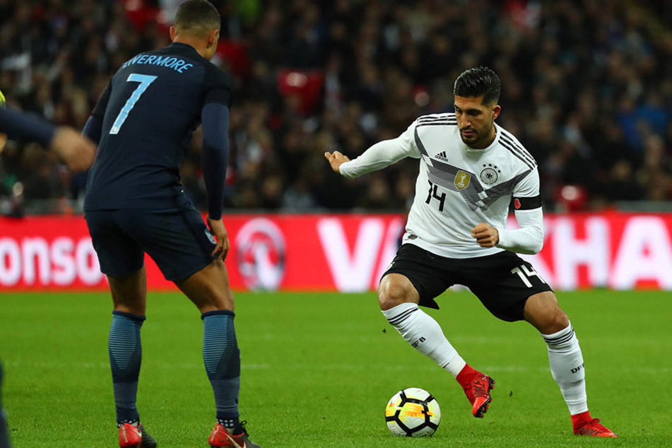 Emre Can (rechts) versucht, an Jake Livermore (links) vorbeizukommen.