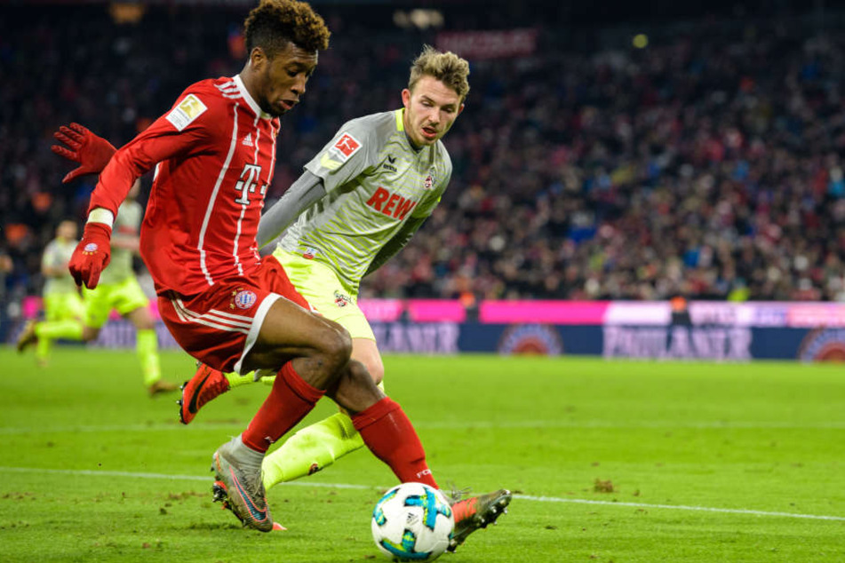 Jannes Horn vom 1. FC Köln (r., gegen Bayern Kingsley Coman) hat das Interesse von RB Leipzig geweckt, soll am Mittwoch wechseln.