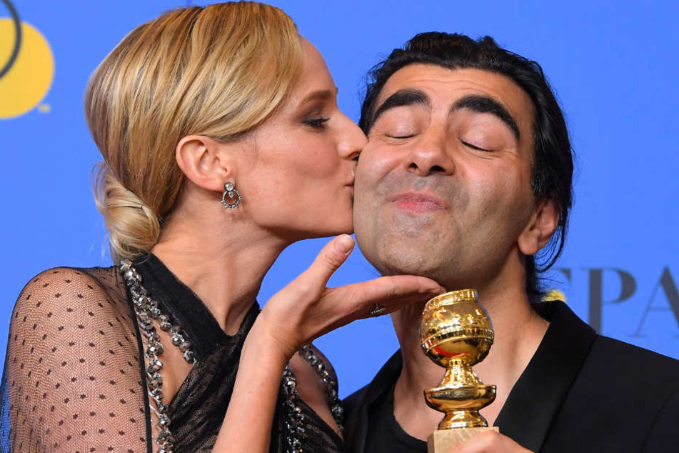 Bei den 75. Golden Globe Awards gewann Fatih Akins (rechts) Film "Aus dem Nichts" in der Kategorie bester nicht-englischsprachiger Film. Schauspielerin Diane Kruger gratuliert dem Preisträger.