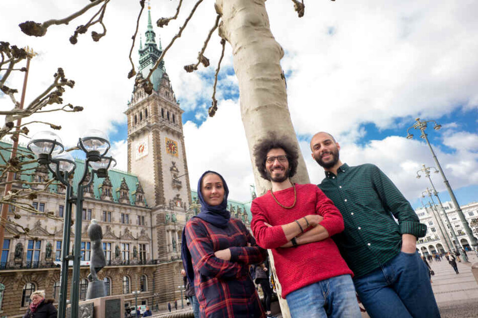 Die drei Redakteure Nilab Langar, Omid Rezaee und Ahmad Alrifaee (von links).