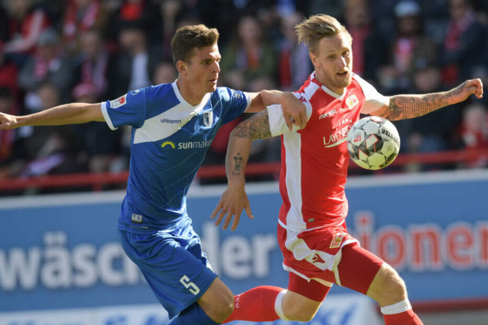 Tobias Müller im Zweikampf mit Unions Sebastian Polter.