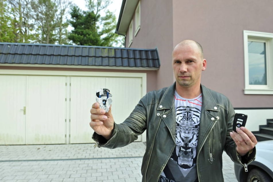 Frank Bauer (40) ist sauer: Schon wieder wurde sein Luxus-BMW direkt vorm Haus geklaut.