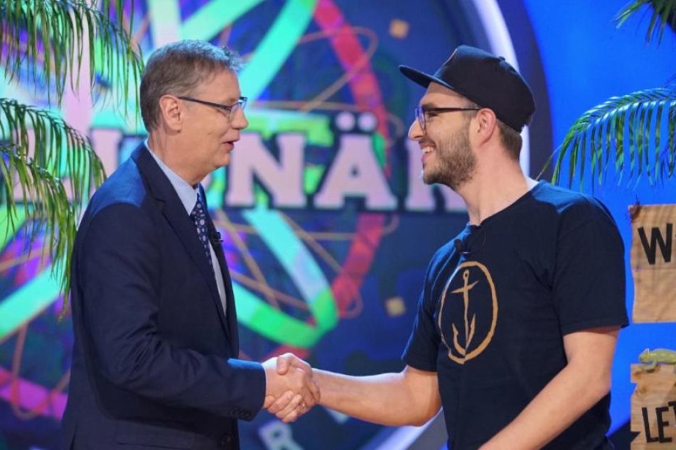 Tim Michatz schüttelt Günther Jauch die Hand. Stolz berichtete er davon, wie er George Clooney begegnete.