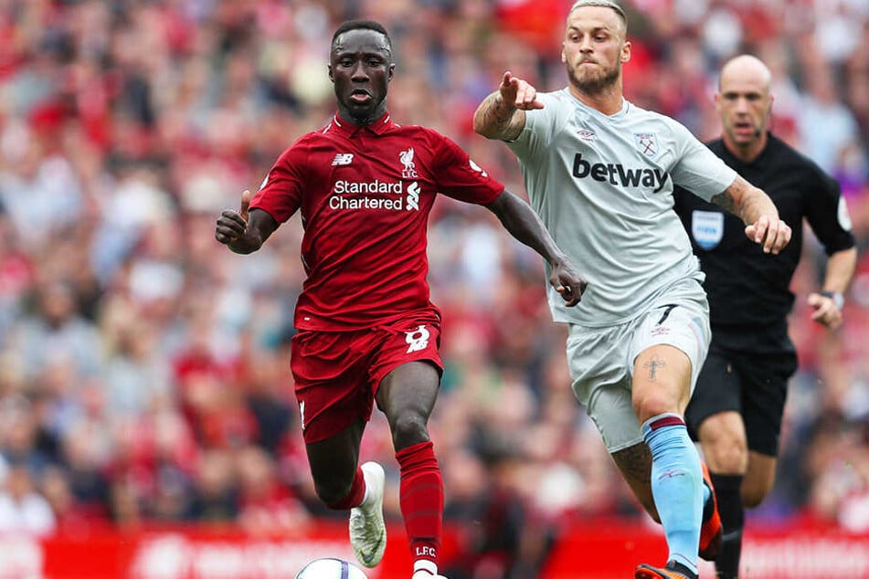 Zwei ehemalige Bundesliga-Stars im Duell: Liverpools Naby Keita (l.) und der frühere Bremer Marko Arnautovic.