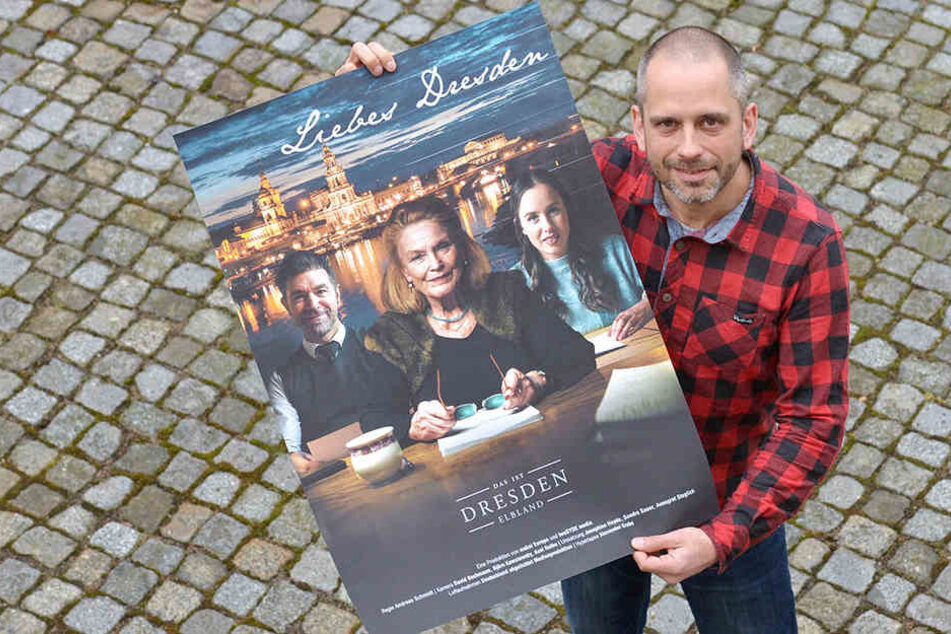 DMG-Marketing-Leiter Marco Blüthgen (43) zeigt das Plakat des ersten Dresden-Filmes "Liebes Dresden".