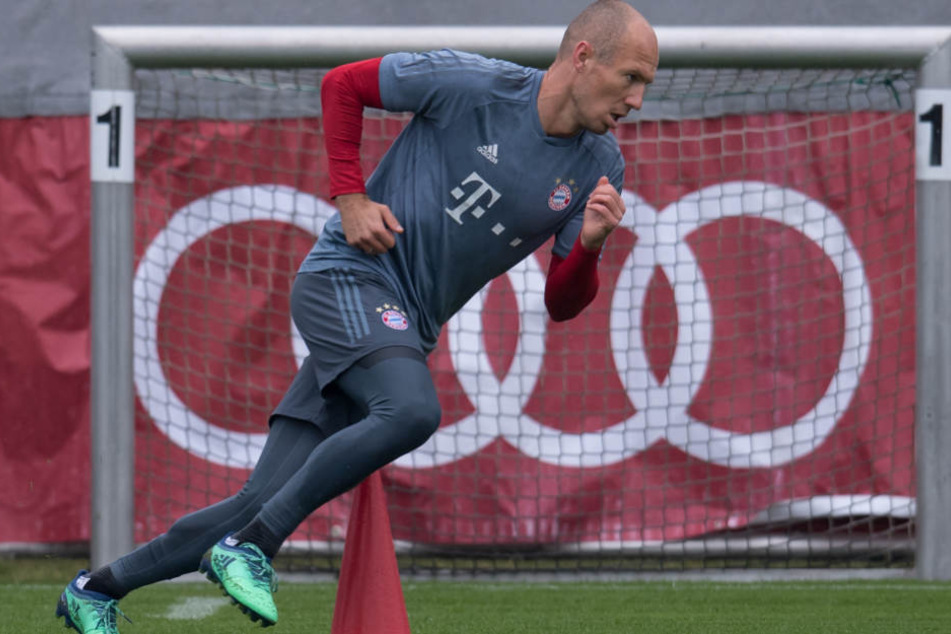 Arjen Robben und der FC Bayern München wollen gegen den VfL Wolfsburg einen Sieg.