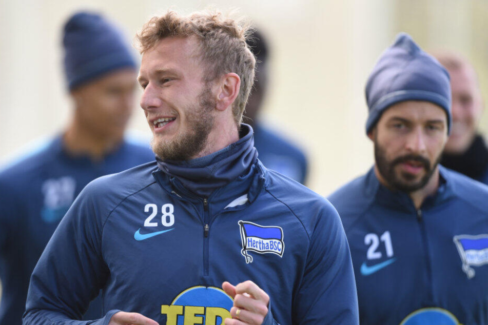 Lustenberger läuft beim letzten öffentlichen Training neben Plattenhardt.