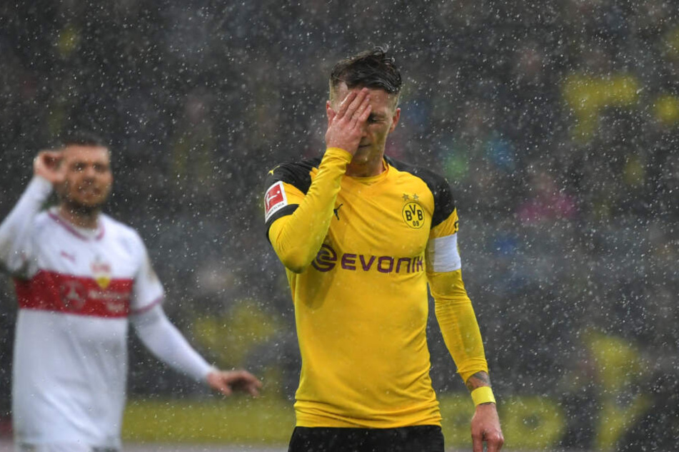 Im Regen stehend: VfB-Kämpfer Alexander Esswein (l.) und BVB-Star Marco Reus (r.).