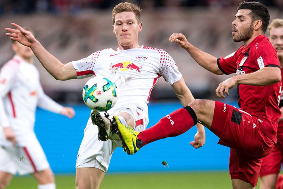 Marcel Halstenberg (l.) hat seinen Vertrag vorzeitig verlängert.