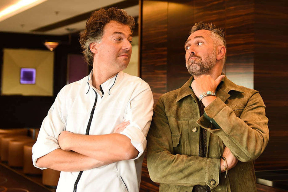 Schicken den jeweils anderen zum Kochen ins Ungewisse: Peter Maria Schnurr (l.) und Roland Trettl (r.).