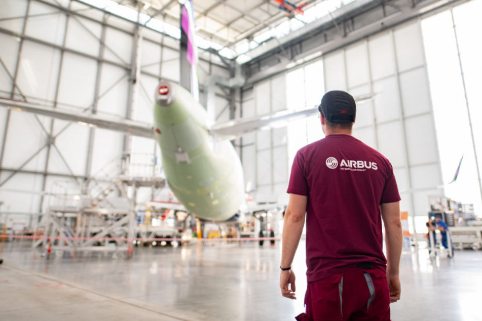 Weniger Mitarbeiter werden in der neuen Produktionslinie zum Bau eines Airbus A320 gebraucht.