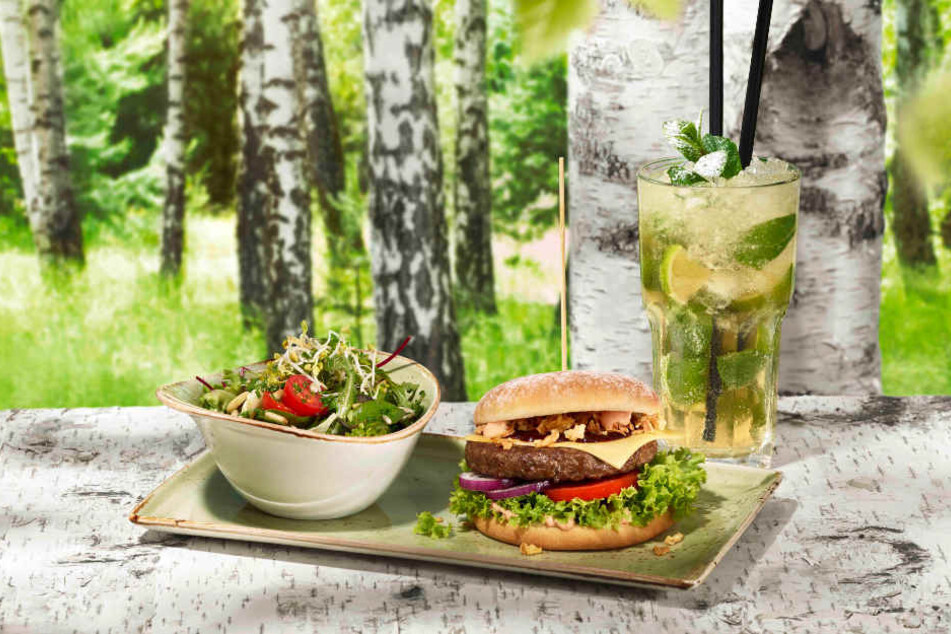 Leckere Cocktails, saftige Burger und knackige Beilagen beschreiben das Konzept von "Hans im Glück".