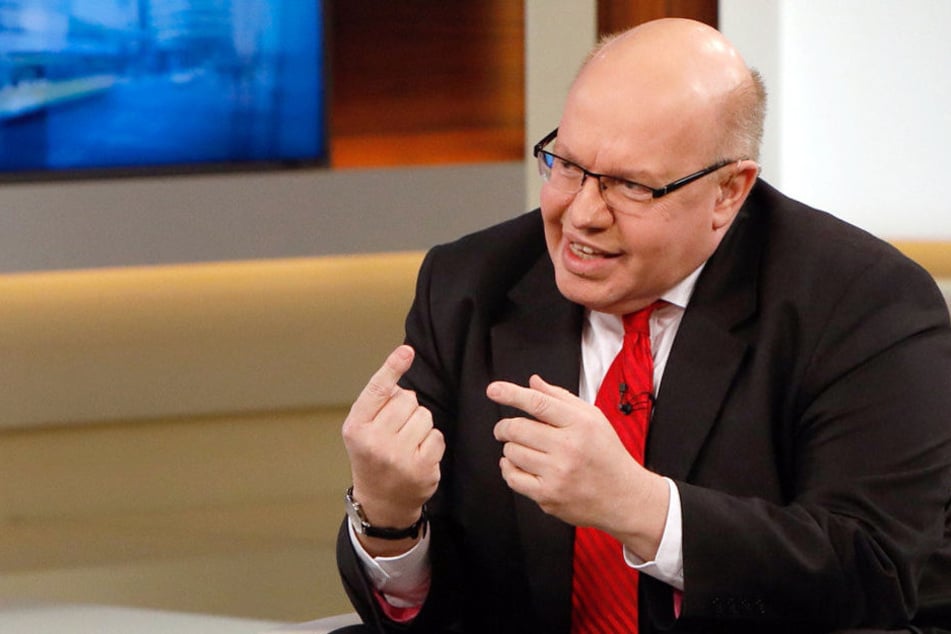 Peter Altmaier (58, CDU): "Ein Einreiseverbot wäre das letzte Mittel. Das behalten wir uns vor."