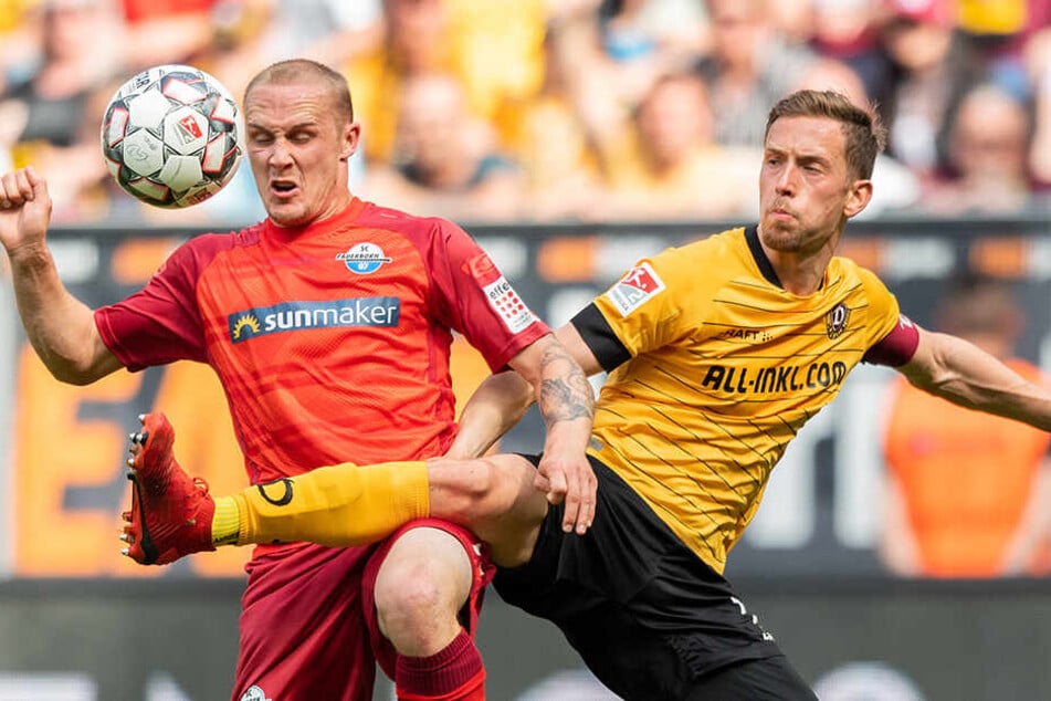 Zuverlässiger Abräumer: Jannik Müller (r.) fährt Paderborns Sven Michel in die Parade.