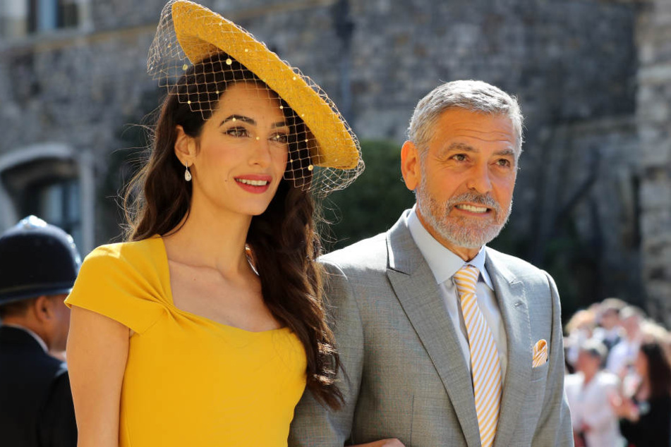 Ob Amal und George Clooney wirklich die Paten von Harrys und Meghans Kind werden?