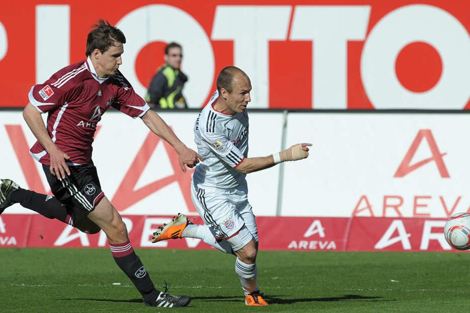 Seine ersten Bundesliga-Minuten sammelte der Innenverteidiger beim 1.FC Nürnberg. Hier im Duell gegen Bayern-Legende Arjen Robben.