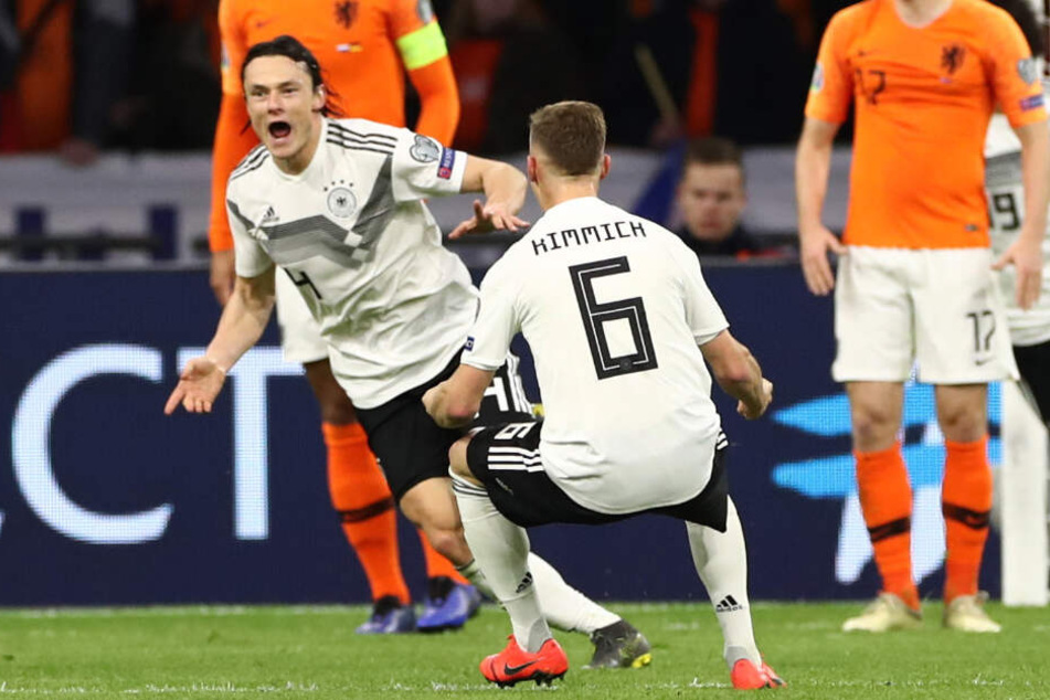 Tooooor! Nico Schulz (links) jubelt über seinen Treffer mit Teamkollege Joshua Kimmich (Mitte).