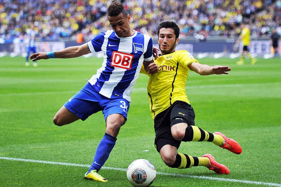 Wurde von Hertha BSC aufgrund seines Riesen-Talents früh in der 1. Bundesliga eingesetzt: Hany Mukhtar (l.), hier im Duell mit dem damaligen BVB-Kicker Nuri Sahin.