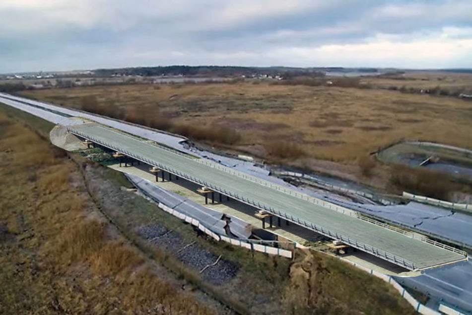 Die Visualisierung zeigt eine Behelfsbrücke über die eingestürzte Autobahn A20.