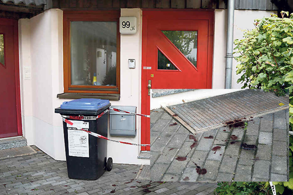 Vor der Haustür der Familie zeugen Blutspuren von dem Drama.