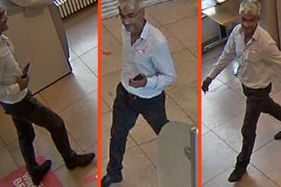 Der unbekannte Täter in der Berliner Sparkasse am Anton-Saefkow-Platz.