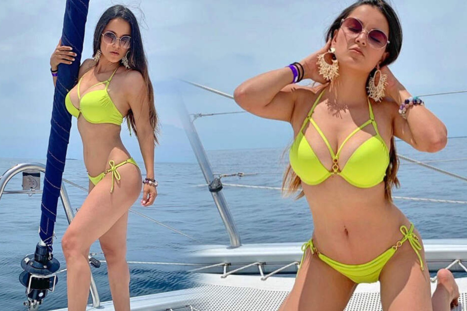 Gekonnt posiert die Reality-TV-Schönheit an Bord einer Yacht.