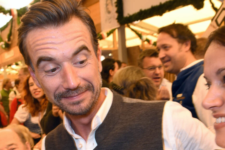 Der Moderator Florian Silbereisen feiert im Schottenhamel Festzelt auf dem Oktoberfest.