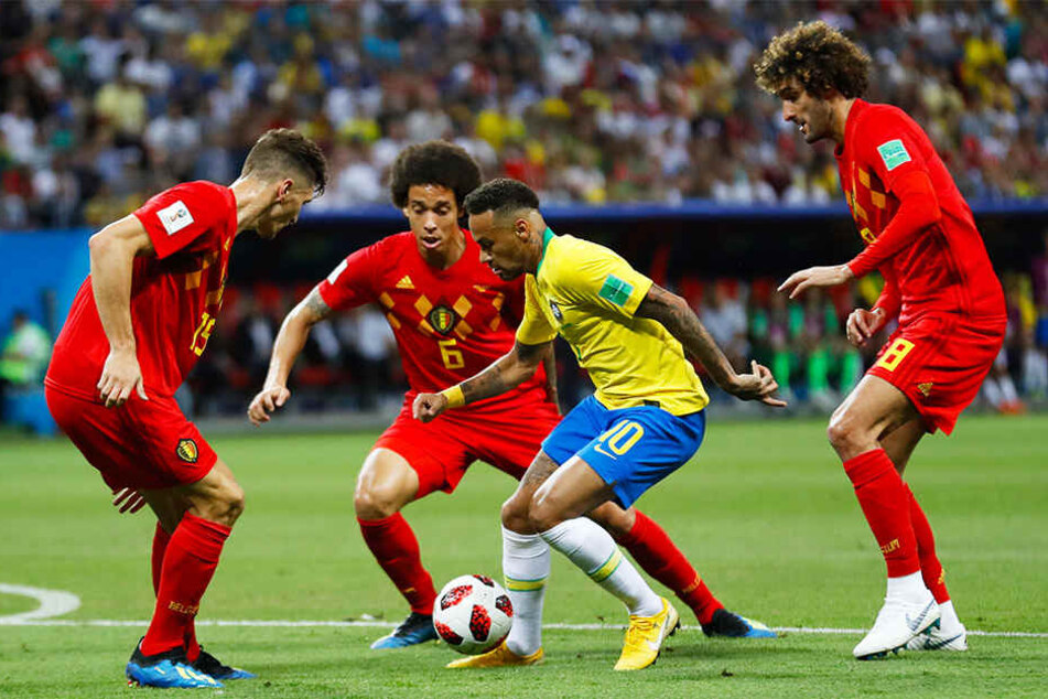 Umzingelt: Gegen Thomas Meunier (l.), Axel Witsel (hinten) und Marouane Fellaini (r.) kam Brasiliens Superstar Neymar (Mitte) nicht durch.