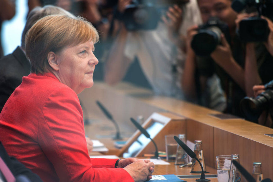 Angela Merkel stellt sich auf der traditionellen Sommer-Pressekonferenz den Fragen der Journalisten.