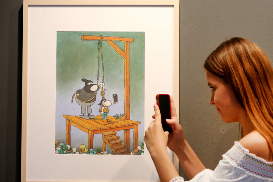 Witzige Cartoons werden gerne fotografiert.