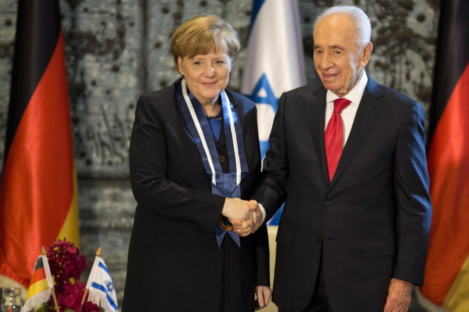 Schimon Peres im Februar 2014 mit Angela Merkel in Jerusalem.