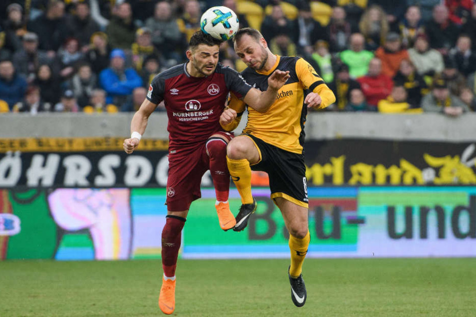 Rico Benatelli (r.) im Kopfballduell mit Nürnbergs Tim Leipold. Gegen Kiel will Benatelli mit seinen Mannen heute die berühmte 40-Punkte-Marke erreichen.