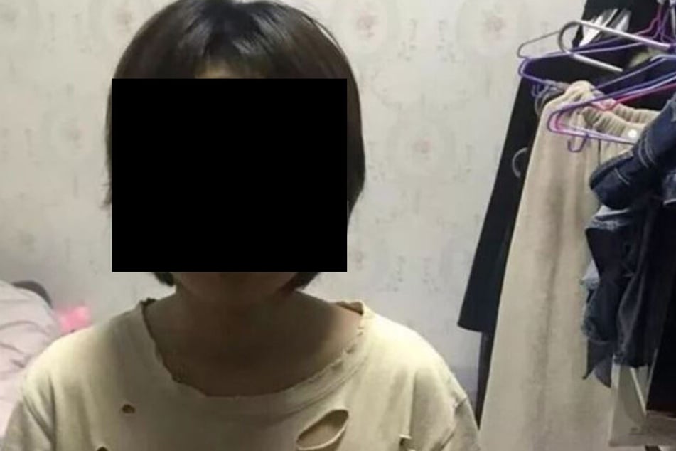 Seine Mutter (28), Frau Ye, nach der Festnahme.