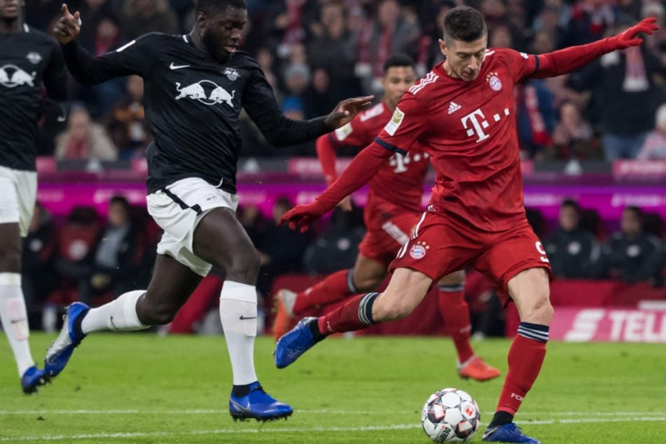 Robert Lewandowski (r.) und der FC Bayern hatten mit Leipzig große Mühe.