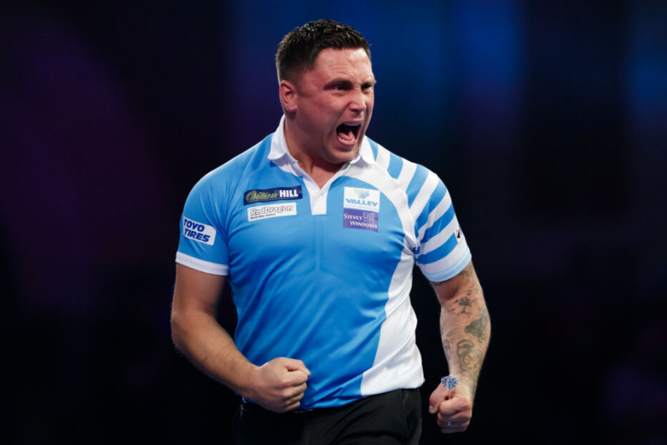 Der Waliser Gerwyn Price, Spitzname "The Iceman", ist ein gewaltiger Muskelprotz, der nicht nur Mund und Augen aufreißt, sondern auf der Bühne auch lauthals schreit.