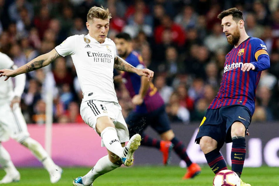 Barcas Lionel Messi (r.) im Duell mit Reals zuletzt oft kritisiertem Toni Kroos.