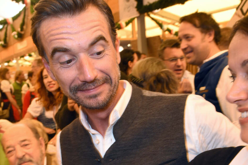 Der Moderator Florian Silbereisen feiert im Schottenhamel Festzelt auf dem Oktoberfest.
