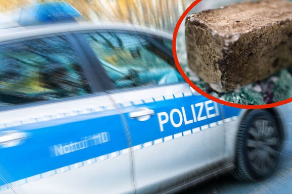 Mit einem Pflasterstein hämmerte der Mann mehrfach gegen das Seitenfenster. (Symbolbild)