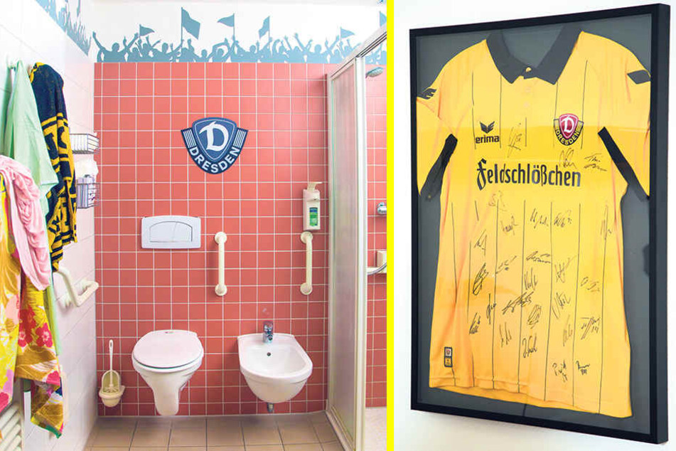 Auch das Bad ist mit Vereinswappen dynamisch eingerichtet. An der Wand hängt ein SGD-Trikot mit allen Unterschriften der Spieler.